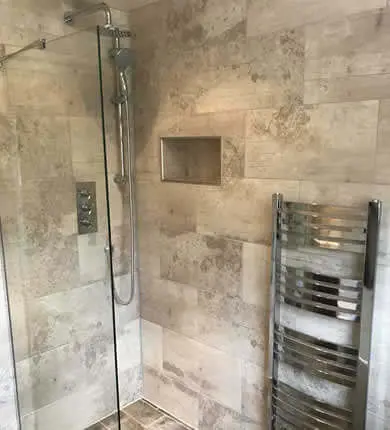 Matching towel rail fitted in Sheffield bathroom